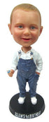 Child in Denim Overalls